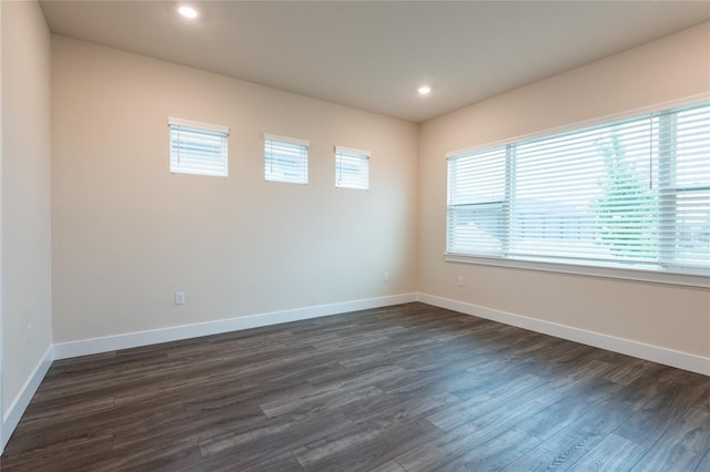 8749 Drummer Plank Dr, Wesley Chapel, FL 33545 - empty room with dark wood-type flooring and recessed lighting