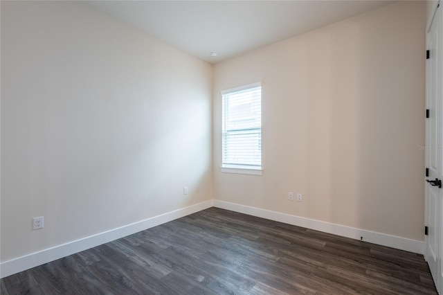 8749 Drummer Plank Dr, Wesley Chapel, FL 33545 - empty room with dark wood-style flooring and baseboards