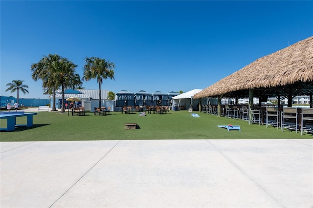 8749 Drummer Plank Dr, Wesley Chapel, FL 33545 - view of property's community with a gazebo and a lawn
