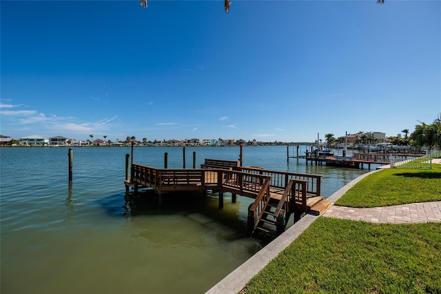 208 Bath Club Blvd N, North Redington Beach, FL 33708 - dock area featuring a yard and a water view