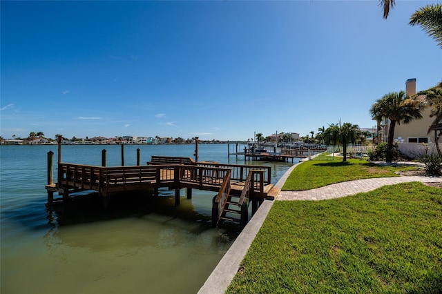 208 Bath Club Blvd N, North Redington Beach, FL 33708 - dock with a lawn and a water view