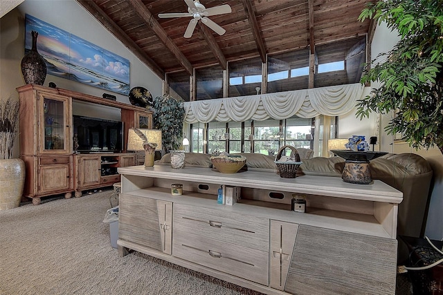 140 Dale Pl, Oldsmar, FL 34677 - interior space featuring a wood ceiling with exposed beams, a ceiling fan, light carpet, high vaulted ceiling, and brown cabinets
