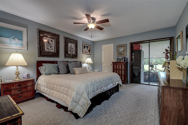 140 Dale Pl, Oldsmar, FL 34677 - carpeted bedroom with access to outside, a textured ceiling, and ceiling fan