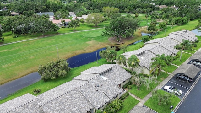 140 Dale Pl, Oldsmar, FL 34677 - aerial view of residential area with a large body of water and a local golf course