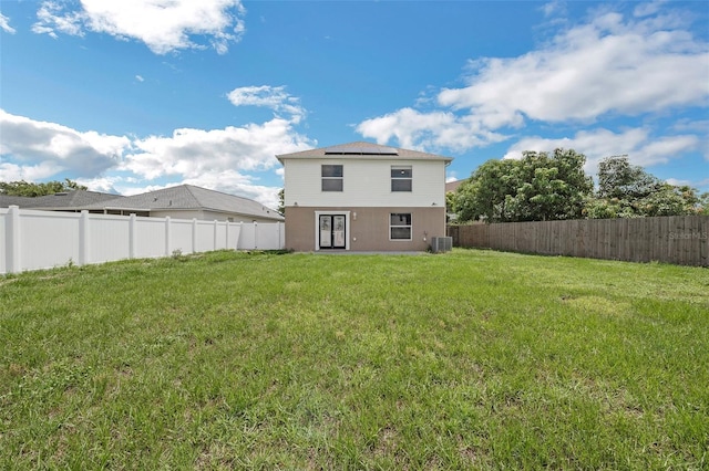 11130 Summer Star Dr, Riverview, FL 33579 - rear view of property featuring roof mounted solar panels and a fenced backyard
