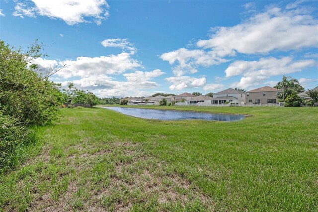 11130 Summer Star Dr, Riverview, FL 33579 - view of grassy yard featuring a water view and a residential view