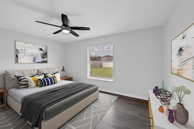11130 Summer Star Dr, Riverview, FL 33579 - bedroom with dark wood-style flooring and a ceiling fan