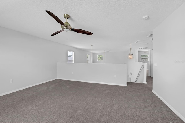 11130 Summer Star Dr, Riverview, FL 33579 - unfurnished room featuring a ceiling fan, dark carpet, and a smoke detector