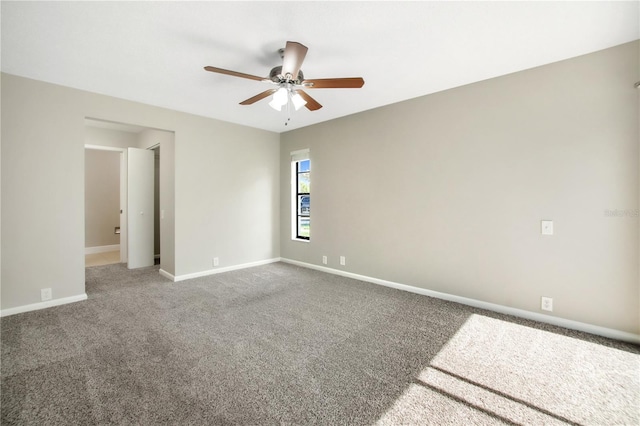 9807 Stephenson Dr, New Port Richey, FL 34655 - carpeted empty room with a ceiling fan and baseboards