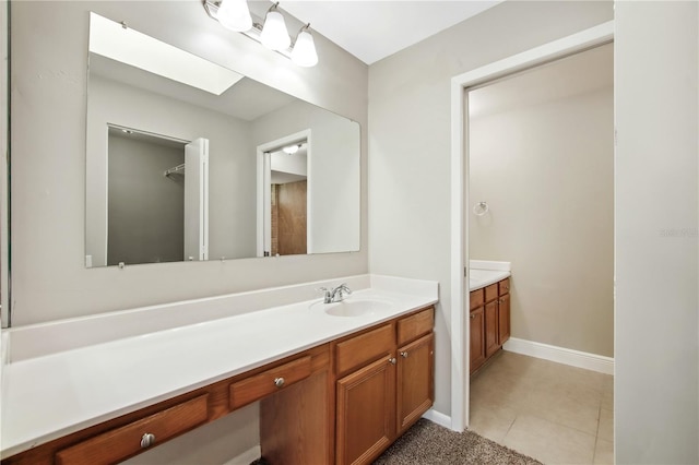 9807 Stephenson Dr, New Port Richey, FL 34655 - full bathroom with vanity and tile patterned flooring