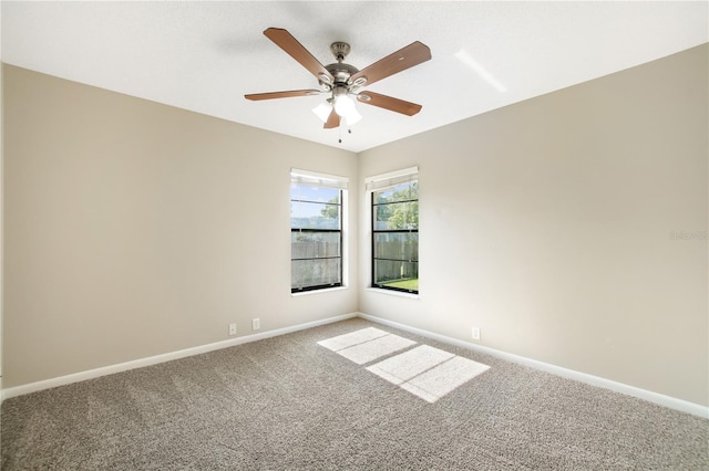 9807 Stephenson Dr, New Port Richey, FL 34655 - spare room with carpet and a ceiling fan