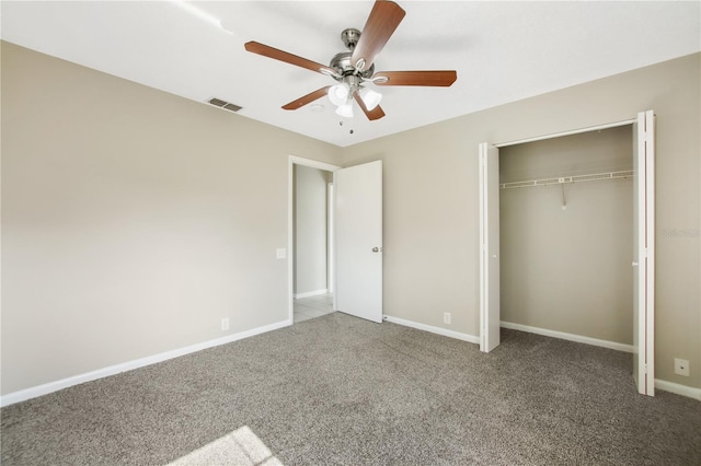 9807 Stephenson Dr, New Port Richey, FL 34655 - unfurnished bedroom with carpet, a closet, and a ceiling fan