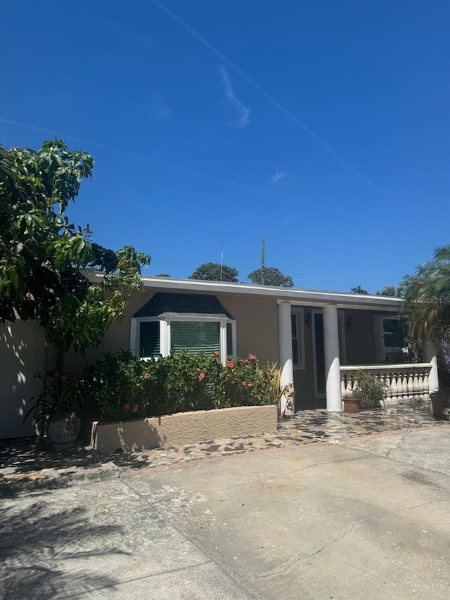 5106 Gateway Dr, Tampa, FL 33615 - view of front of home with stucco siding