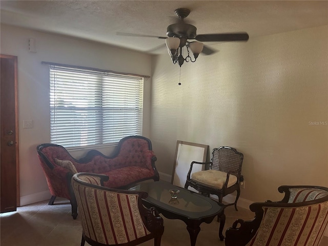 5106 Gateway Dr, Tampa, FL 33615 - living area featuring ceiling fan and tile patterned floors