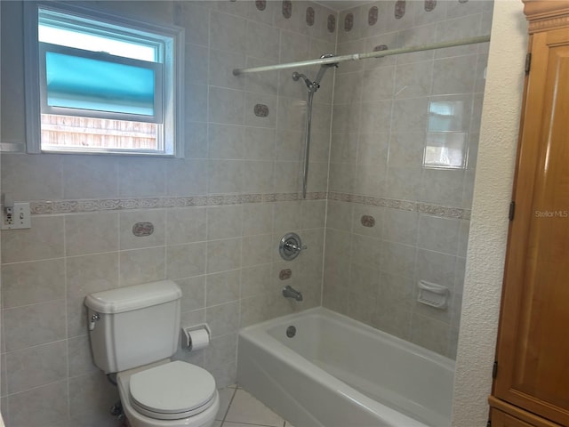5106 Gateway Dr, Tampa, FL 33615 - bathroom with shower / washtub combination and tile walls