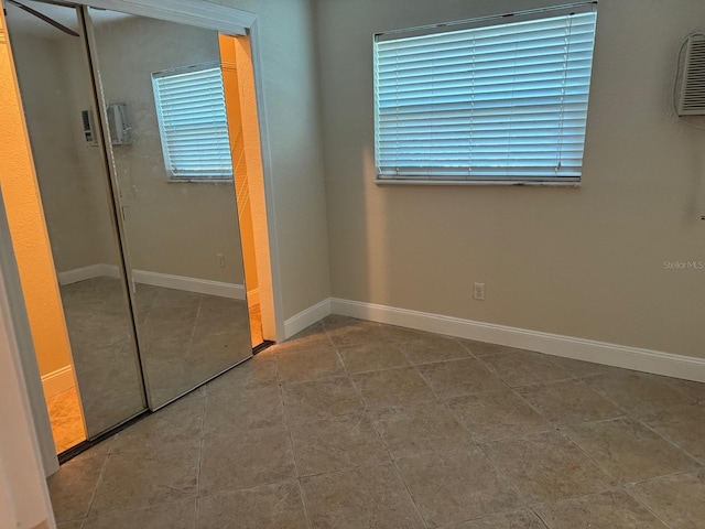 5106 Gateway Dr, Tampa, FL 33615 - unfurnished bedroom with a closet and tile patterned flooring
