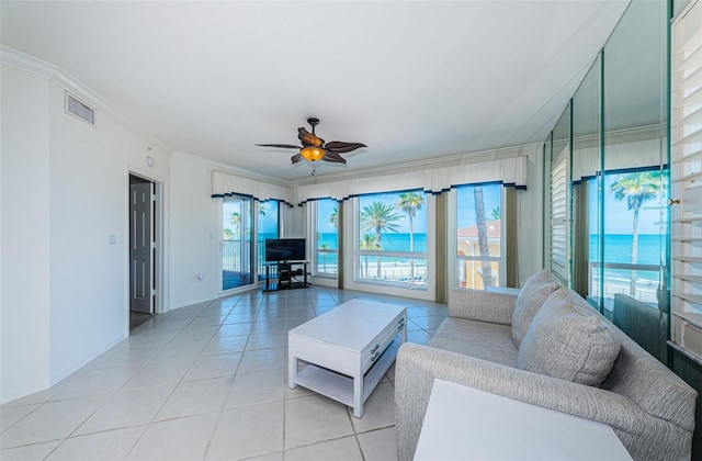 16600 Gulf Blvd Unit 437, North Redington Beach, FL 33708 - living area with plenty of natural light, light tile patterned floors, a ceiling fan, and ornamental molding