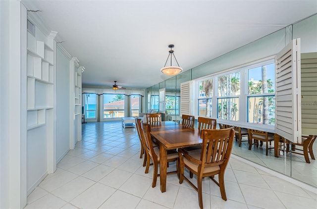 16600 Gulf Blvd Unit 437, North Redington Beach, FL 33708 - dining space featuring ceiling fan, light tile patterned floors, and built in features