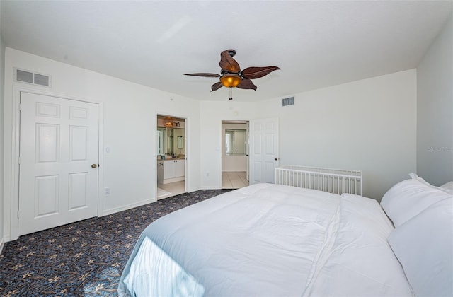 16600 Gulf Blvd Unit 437, North Redington Beach, FL 33708 - carpeted bedroom with ensuite bathroom and ceiling fan