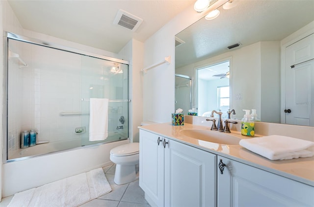 16600 Gulf Blvd Unit 437, North Redington Beach, FL 33708 - bathroom with vanity, tile patterned flooring, and enclosed tub / shower combo
