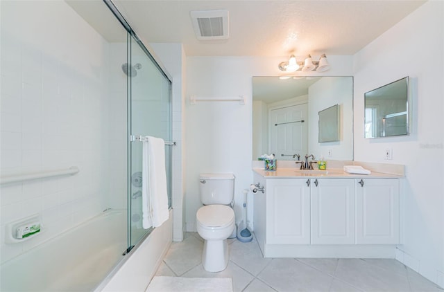 16600 Gulf Blvd Unit 437, North Redington Beach, FL 33708 - bathroom with tile patterned floors, bath / shower combo with glass door, and vanity