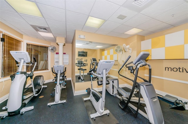 16600 Gulf Blvd Unit 437, North Redington Beach, FL 33708 - exercise room featuring a paneled ceiling and baseboards
