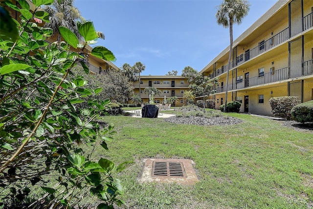 11485 Oakhurst Rd Unit 310, Largo, FL 33771 - view of community with a yard