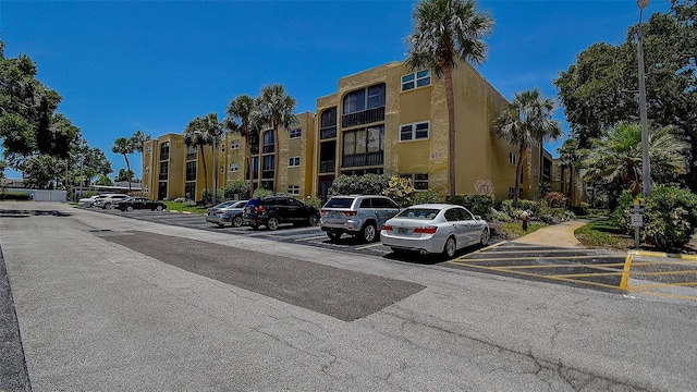 11485 Oakhurst Rd Unit 310, Largo, FL 33771 - view of building exterior featuring uncovered parking