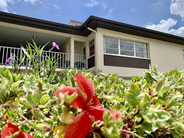 4712 Marine Pkwy Unit 203, New Port Richey, FL 34652 - view of side of property with stucco siding