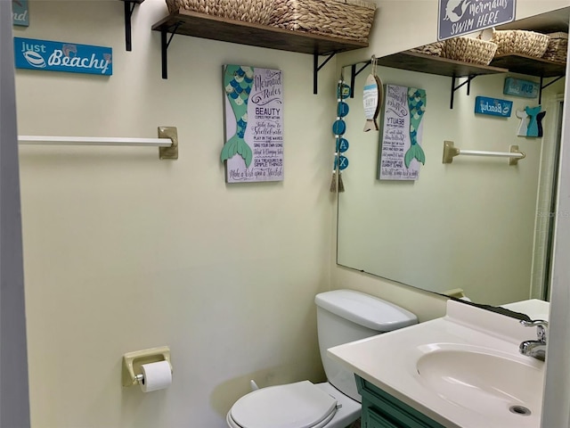 4712 Marine Pkwy Unit 203, New Port Richey, FL 34652 - bathroom featuring toilet and vanity