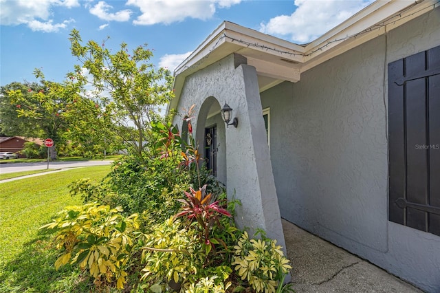 602 Hillpoint Way, Brandon, FL 33510 - view of property exterior featuring a yard and stucco siding