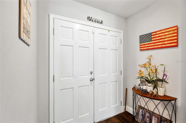 602 Hillpoint Way, Brandon, FL 33510 - foyer entrance featuring dark wood finished floors and baseboards