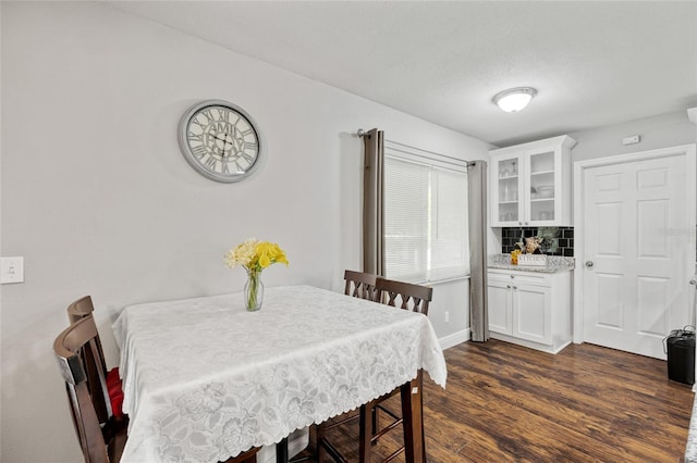 602 Hillpoint Way, Brandon, FL 33510 - dining area featuring dark wood-type flooring and baseboards