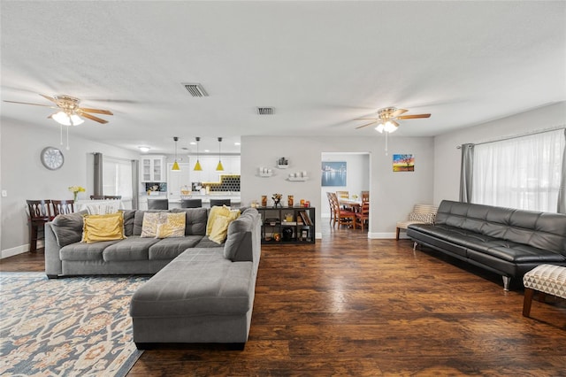 602 Hillpoint Way, Brandon, FL 33510 - living room featuring a ceiling fan and dark wood finished floors