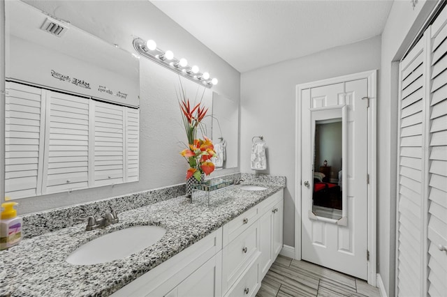 602 Hillpoint Way, Brandon, FL 33510 - full bathroom with double vanity and a closet