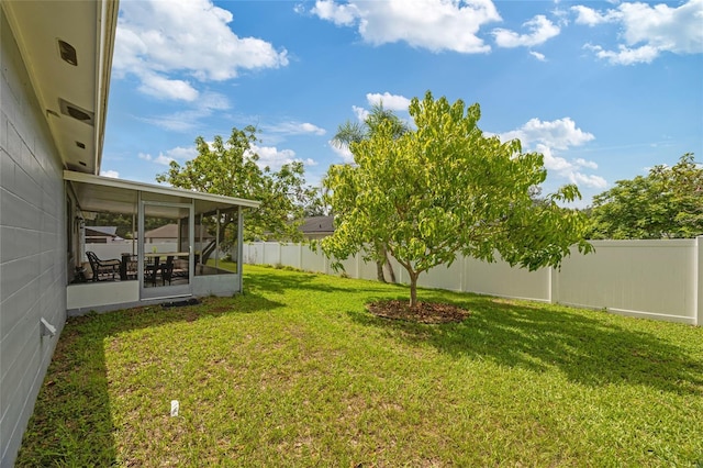 602 Hillpoint Way, Brandon, FL 33510 - fenced backyard with a sunroom