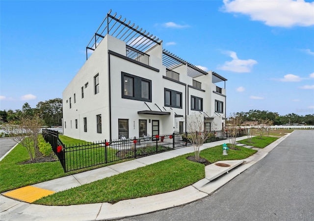 6206 64th Way N, Pinellas Park, FL 33781 - view of front of house featuring a fenced front yard and stucco siding
