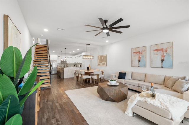 6206 64th Way N, Pinellas Park, FL 33781 - living room with dark wood finished floors, a ceiling fan, recessed lighting, and stairs