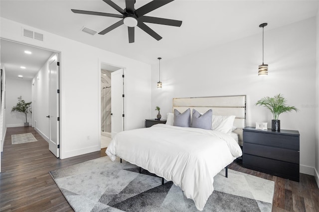6206 64th Way N, Pinellas Park, FL 33781 - bedroom with dark wood-type flooring, ceiling fan, recessed lighting, and ensuite bath