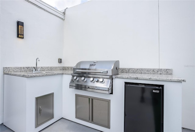 6206 64th Way N, Pinellas Park, FL 33781 - view of patio featuring exterior kitchen