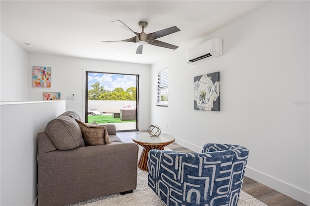6206 64th Way N, Pinellas Park, FL 33781 - living area featuring a wall mounted AC, ceiling fan, and wood finished floors