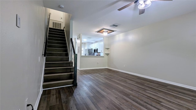 1247 Kennewick Ct, Wesley Chapel, FL 33543 - stairway with a ceiling fan and wood finished floors
