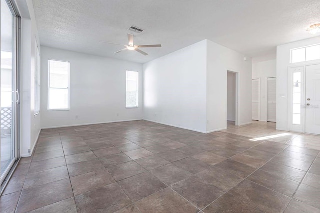 5017 46th St W, Bradenton, FL 34210 - unfurnished room with a ceiling fan and a textured ceiling