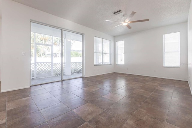 5017 46th St W, Bradenton, FL 34210 - unfurnished room featuring a ceiling fan and a textured ceiling