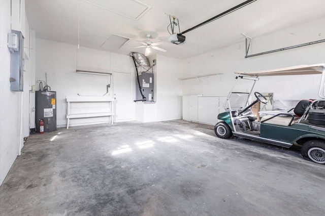 5017 46th St W, Bradenton, FL 34210 - garage with electric water heater, a garage door opener, heating unit, and ceiling fan