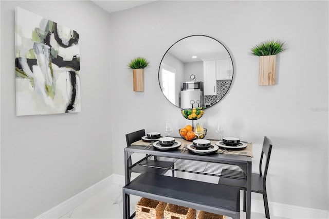 8010 W Hiawatha St, Tampa, FL 33615 - dining room with baseboards and marble finish floors