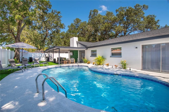 8010 W Hiawatha St, Tampa, FL 33615 - view of pool with a patio area and a fenced backyard