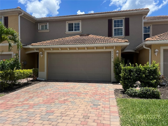 3724 Crofton Ct, Fort Myers, FL 33916 - view of front of house featuring stucco siding, decorative driveway, and a tiled roof