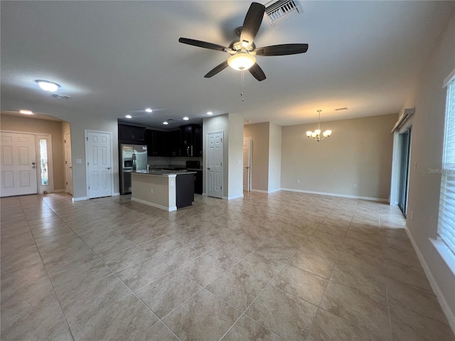 3724 Crofton Ct, Fort Myers, FL 33916 - unfurnished living room featuring a chandelier, light tile patterned flooring, a ceiling fan, and recessed lighting