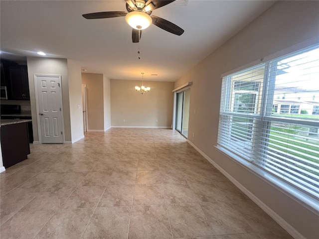 3724 Crofton Ct, Fort Myers, FL 33916 - unfurnished living room with a chandelier, a ceiling fan, and light tile patterned floors